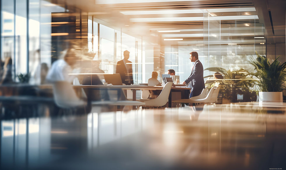 Business meeting in modern office with people discussing work near windows.