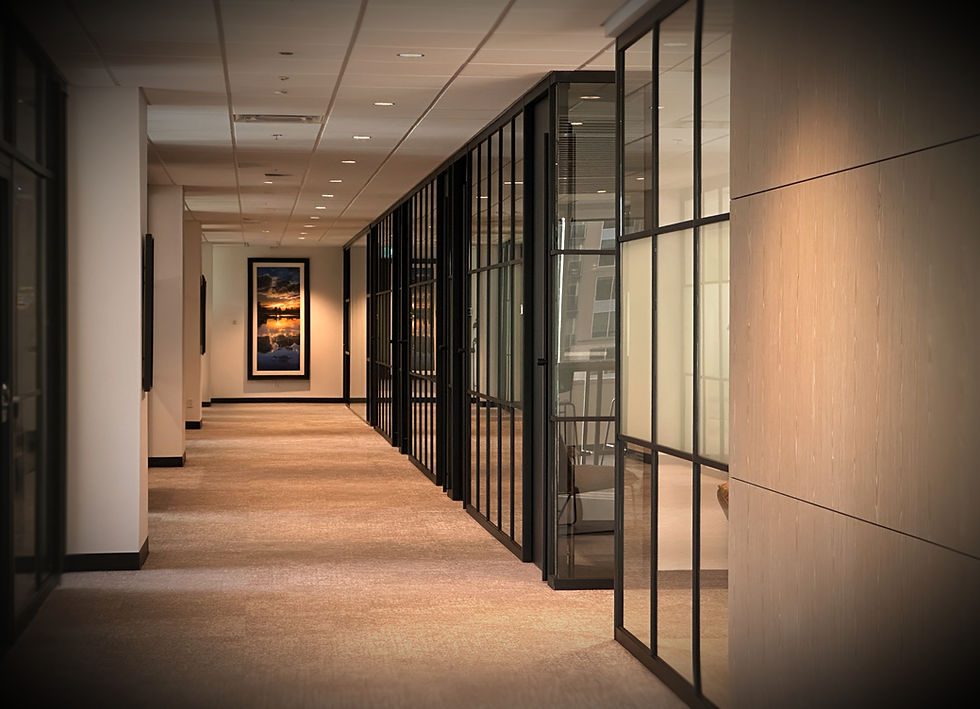 coril-holdings-offices-calgary-beltlline-black-framed-windows-hallway_edits_edited_edited.
