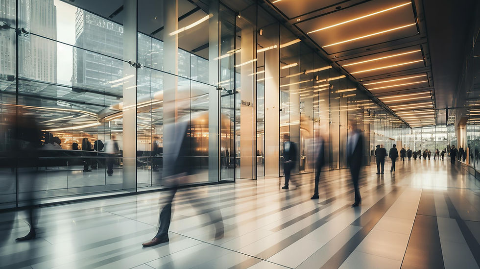 silouettes of people walking downtown in an office building